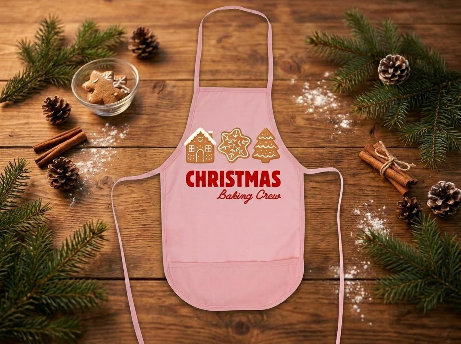 Pink holiday-print matching adult and kid cooking apron set