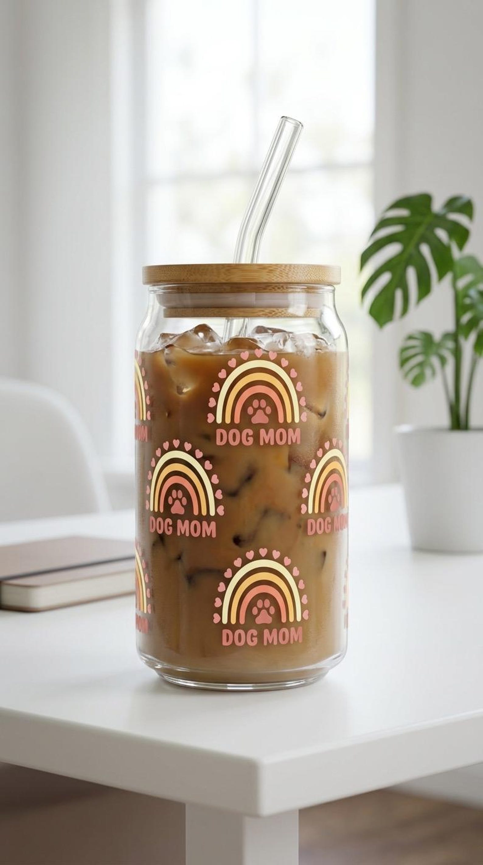 16oz glass tumbler printed with a paw-print design
